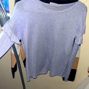 It is a purple shirt it is never been worn